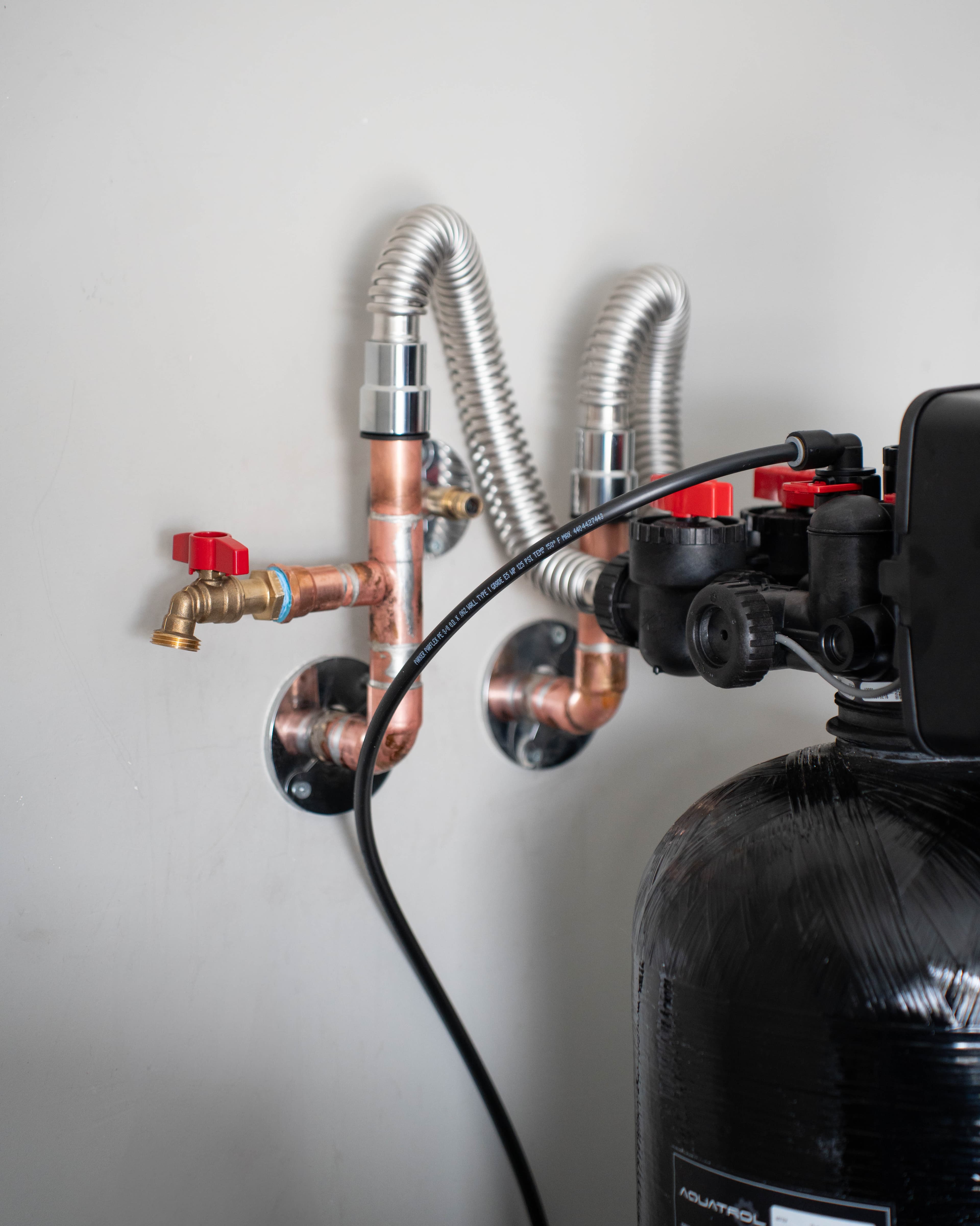 Call-Us Plumbing technician at a Phoenix home