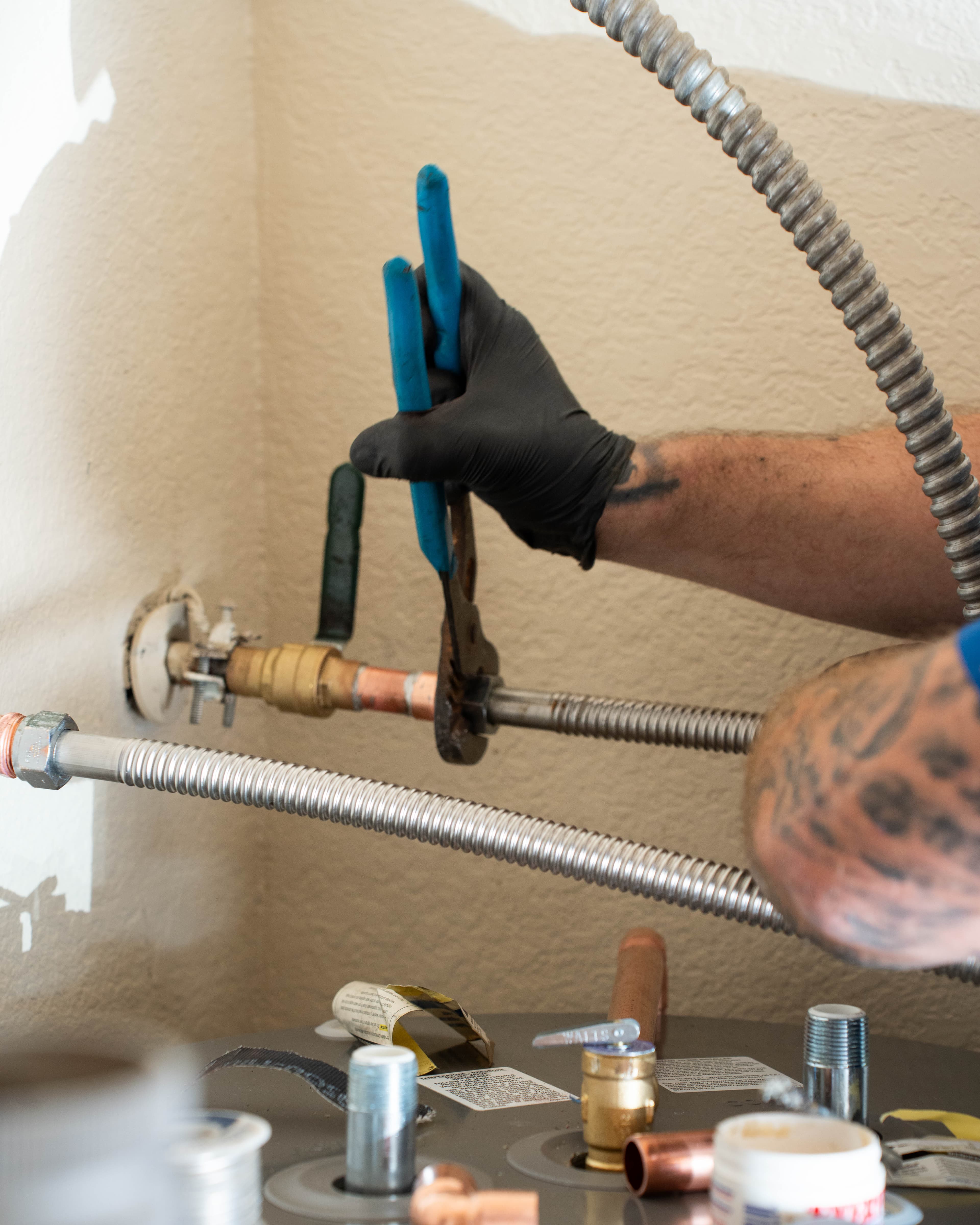 Call-Us plumber installing a new water heater